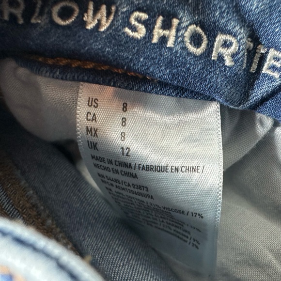 American Eagle Outfitters Super Low Shortie Cuffed Distressed Denim Shorts - Picture 4 of 6